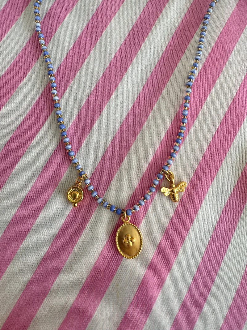 Bougainvillea Café Souvenir Necklace in Indigo